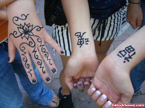 Henna Tattoos On Hanfd And Kanji Symbols Tattoos On Wrists