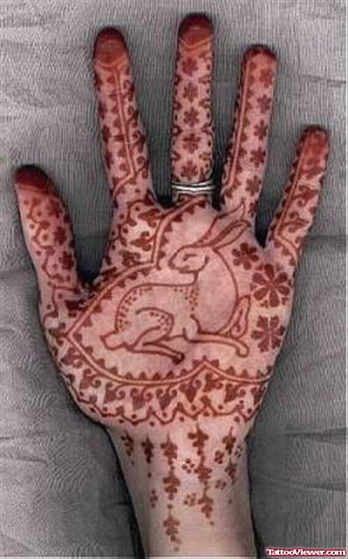 Rabbit And Henna Tattoo On Hand