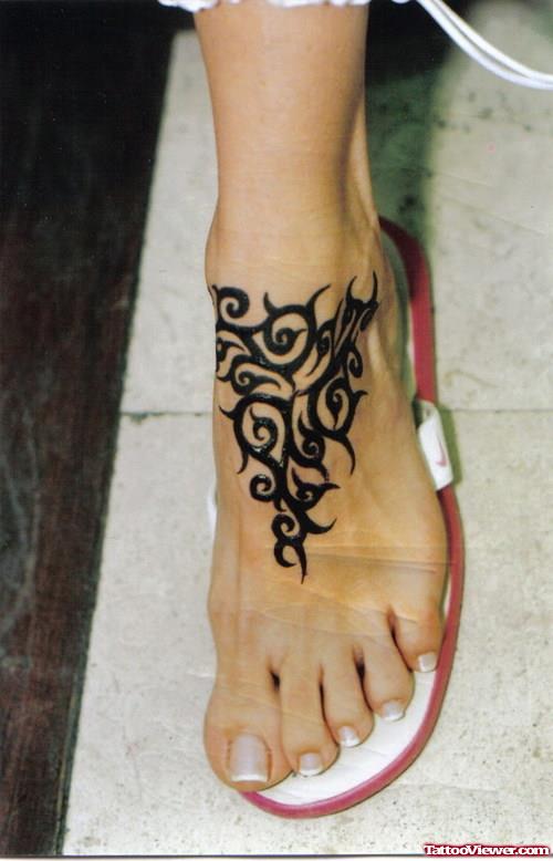 Henna Tribal Tattoo On Girl Left Foot