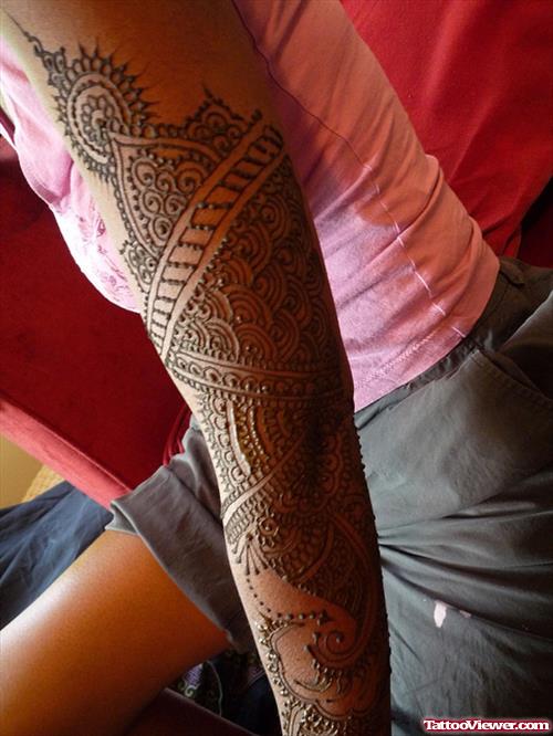 Black Ink Henna Tattoo On Left Sleeve