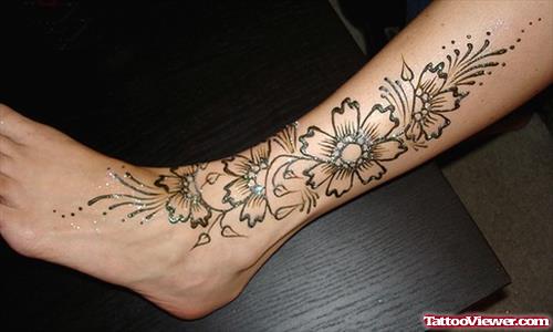 Henna Flowers Tattoos On Left Sleeve