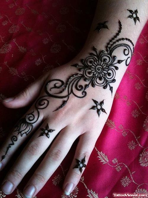 Henna Flowers Tattoo On Left Back Hand