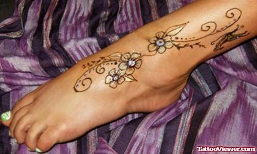Girl Left Ankle Henna Tattoo