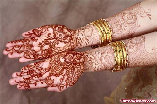 Girl With Henna Tattoos On Both Hands