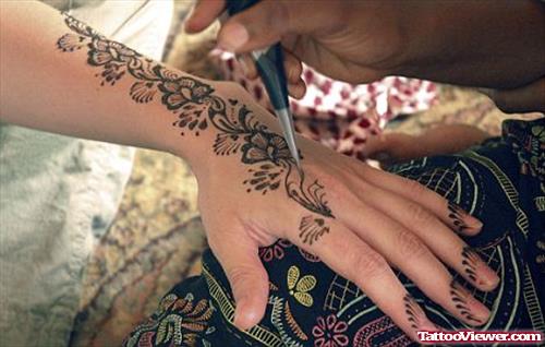 Henna Flower Tattoos On Left Arm