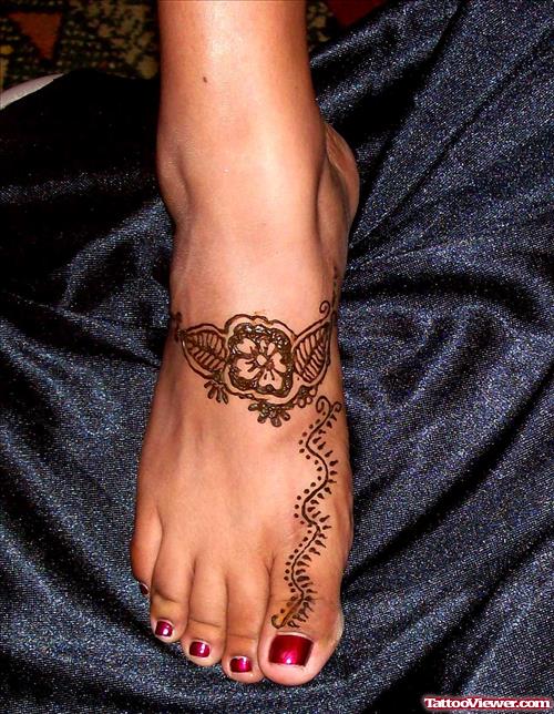 Beautiful Henna Tattoo On Girl Right Foot