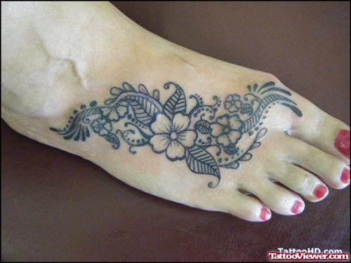 Grey ink Henna Tattoo On Girl Right Foot