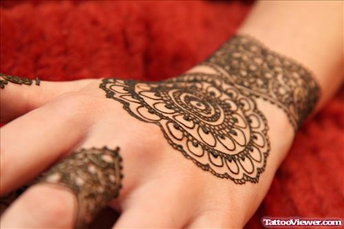 Floral Henna Tattoo On Left Hand