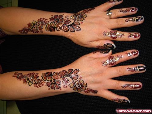 Colored Henna Tattoos On Girl Hands