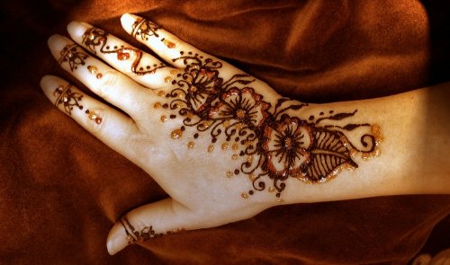 Henna Flowers Tattoos On Right Hand