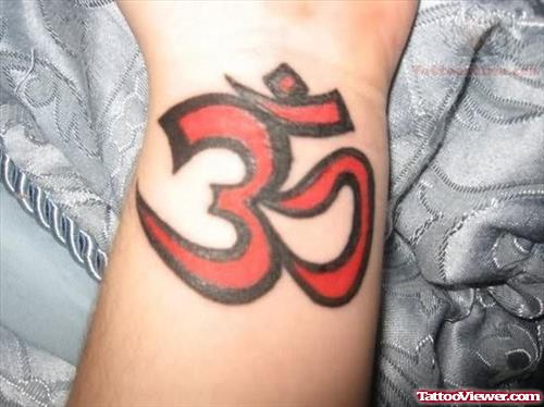 Red-Black Om Tattoo On Wrist