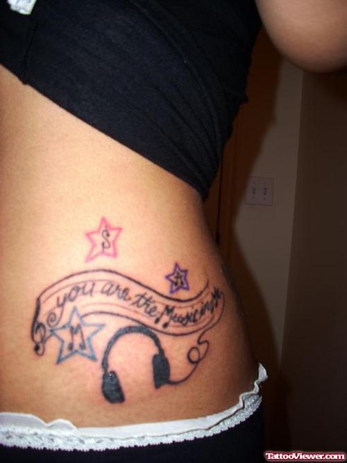 Stars And Music Tattoo On Hip