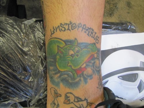 Green Ink Hippo Tattoo