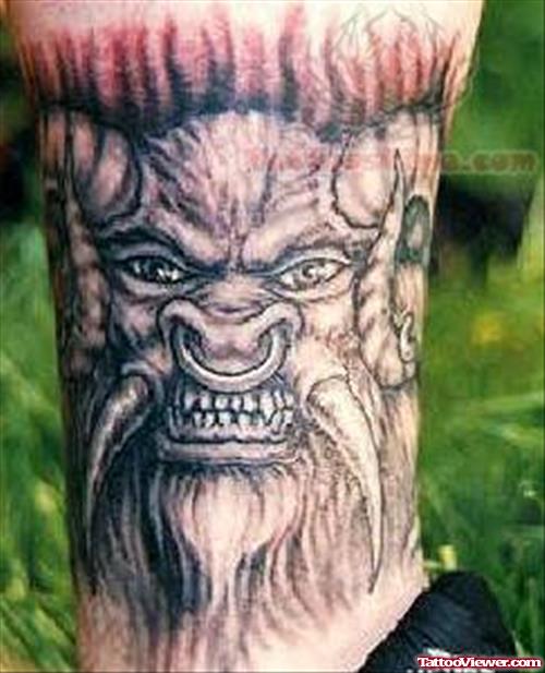 Horror Face Tattoo On Leg