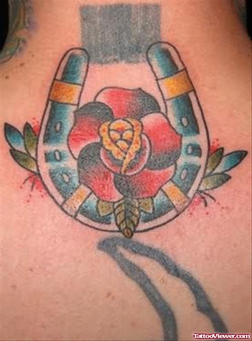 Coloured Horseshoe And Flower Tattoo