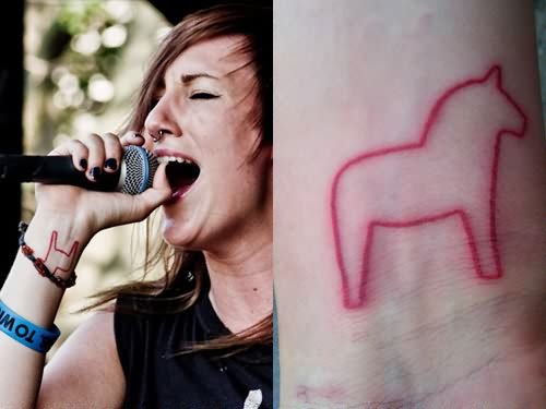 Jacqui SandellвЂ™s Dala Horse Tattoo on Her Wrist