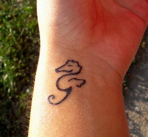 Outline Sea Horse Tattoo On Wrist