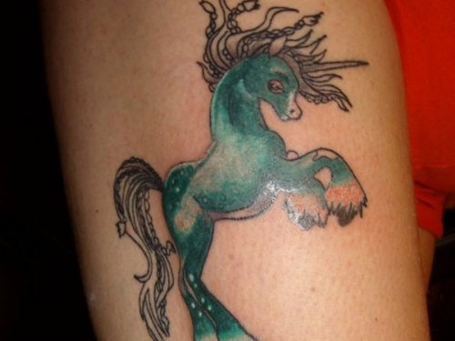 Fantasy Horse Tattoo On Bicep