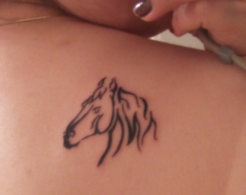 Awful Black Tribal Horse Tattoo On Right Back Shoulder