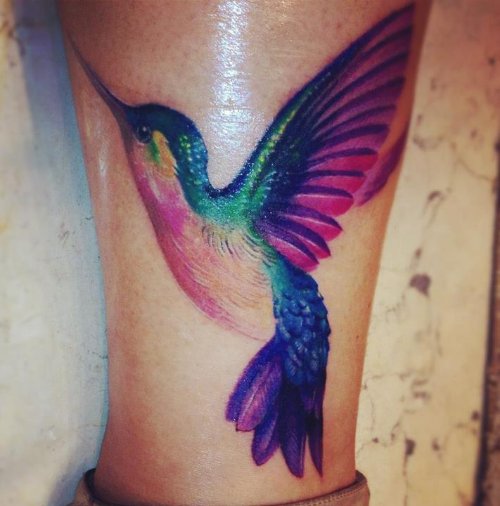 Color Hummingbird Tattoo On Leg Closeup Image
