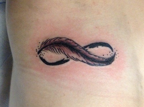 Feather Infinity Tattoo On Side Rib