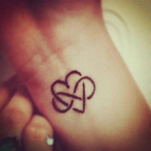 Black Heart and Infinity Tattoo On Wrist