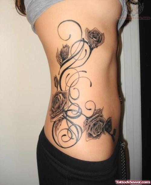 Flower Vine Tattoos On Side Rib
