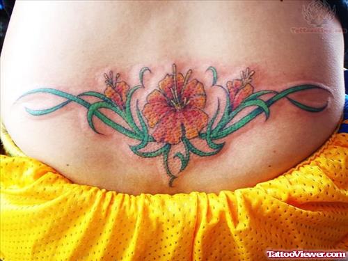 Ivy Flowers Tattoo On Lower Back