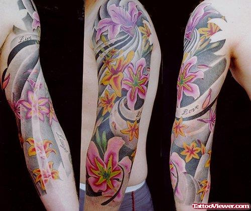 Colored Pink Flowers Japanese Tattoo On Sleeve