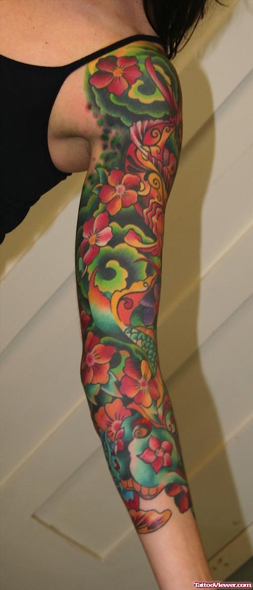 Japanese Color Flowers Tattoo On Girl Left Sleeve