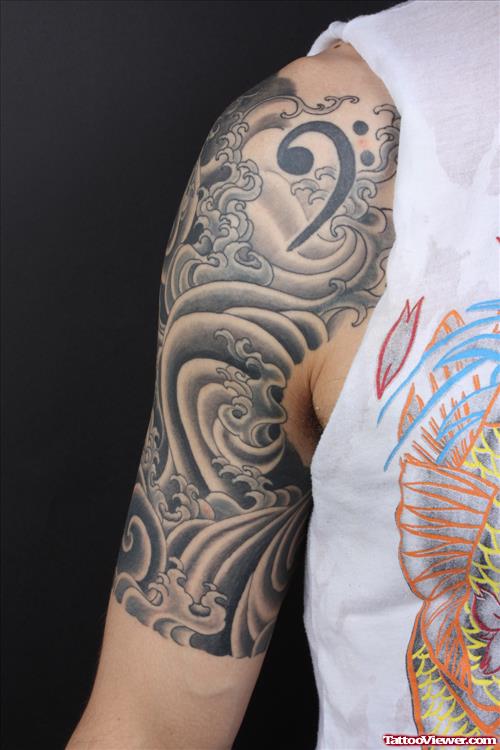 Grey Ink Japanese Tattoo On Half Sleeve