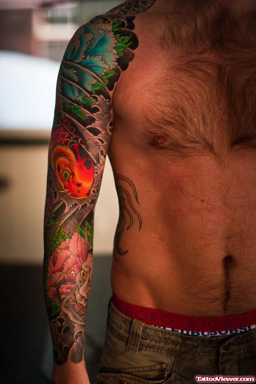 Amazing Colored Japanese Tattoo On Man Right Sleeve