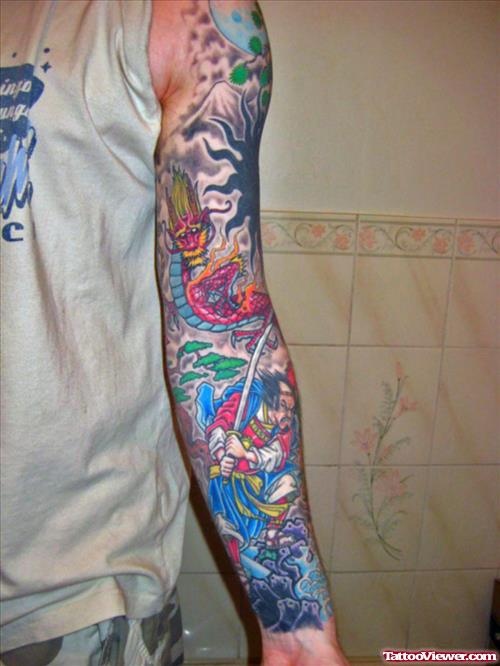 Attractive Colored Japanese Tattoo On Man Left Sleeve