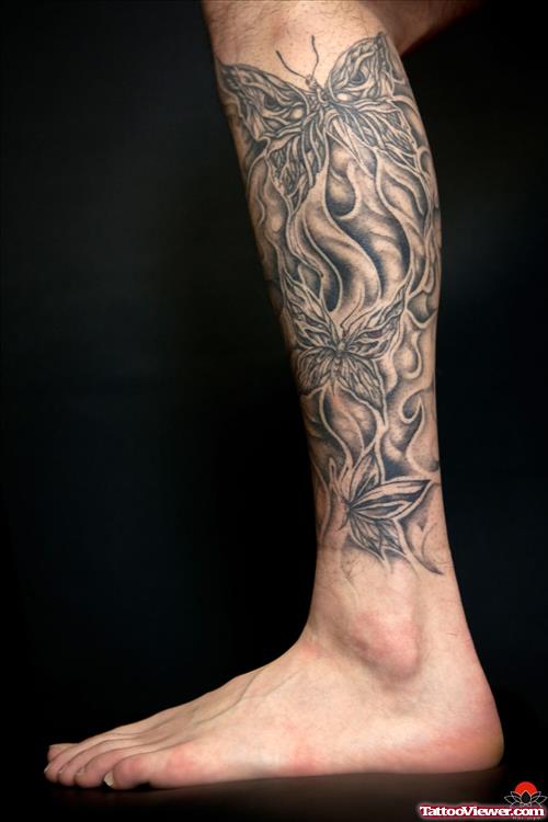 Grey Ink Japanese Tattoo On Left Leg