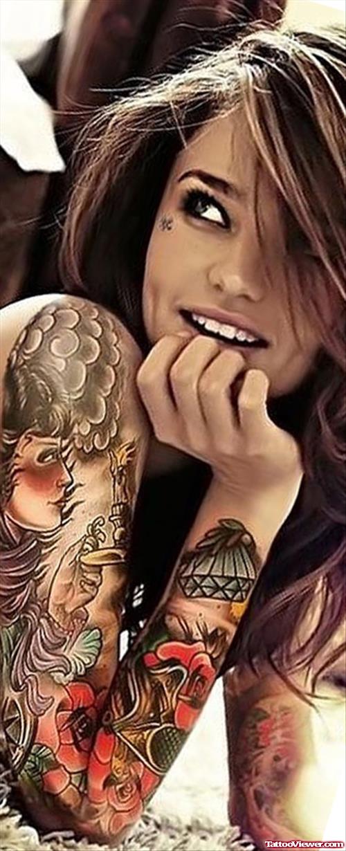 Girl With Colored Japanese Tattoo On Full Sleeve