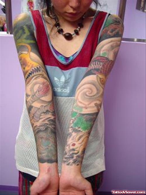 Colored Japanese Tattoos On Girl Both Sleeves