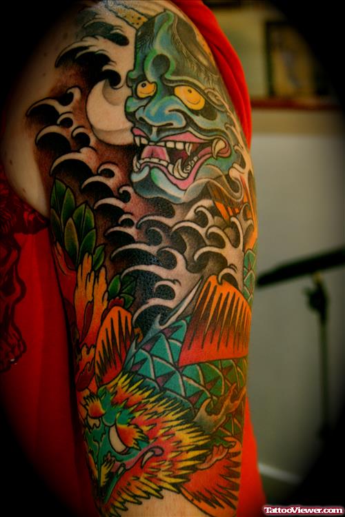 Amazing Colored Japanese Dragon Tattoo On Half Sleeve