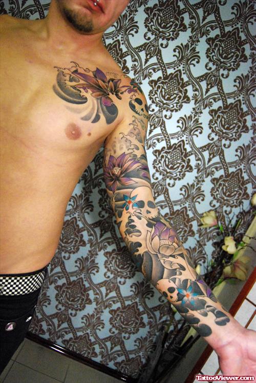 Man Showing Japanese Flower Tattoos On Left Sleeve