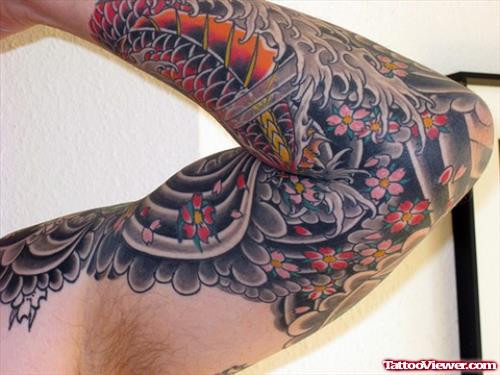 Koi And Japanese Flowers Tattoo On Sleeve