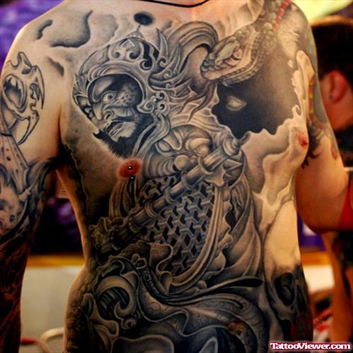 Grey Ink Traditional Japanese Tattoo On Man Chest