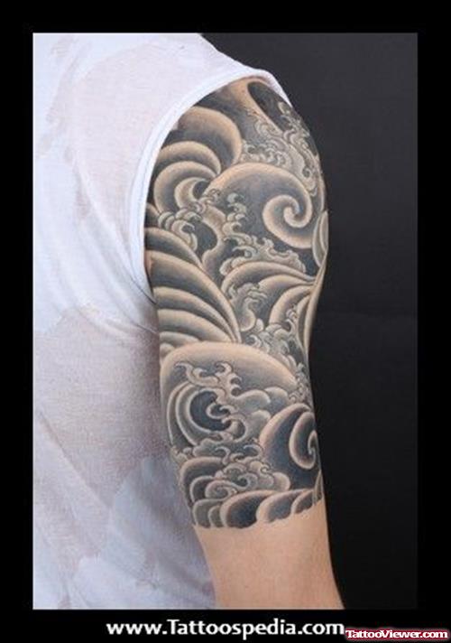 Amazing Grey Ink Japanese Tattoo On Half Sleeve