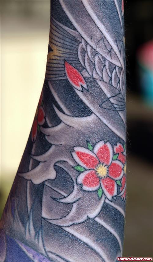 Japanese Waves And Flower Tattoo