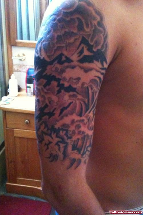 Grey Ink Japanese Waves Tattoo On Right Half Sleeve