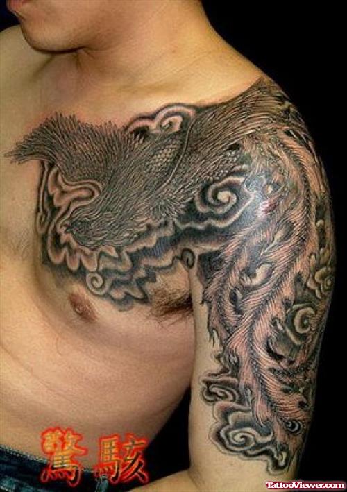 Grey Ink Phoenix Japanese Tattoo On Chest And Left Half Sleeve