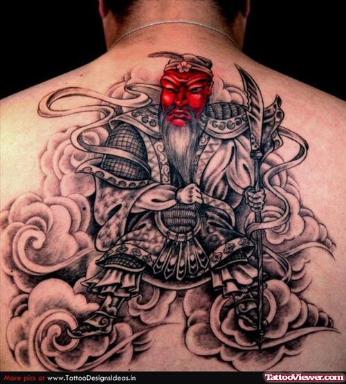 Grey Ink Japanese Tattoo On Man Upperback