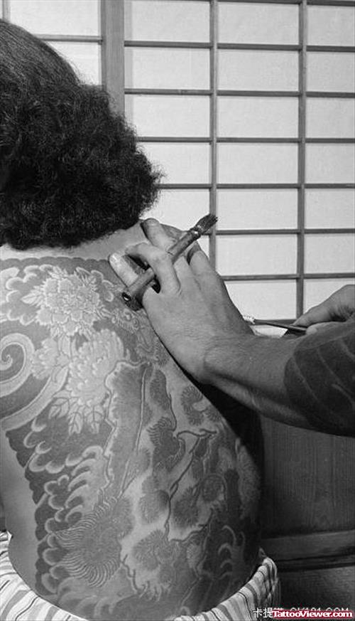 Grey Ink Japanese Tattoo On Back