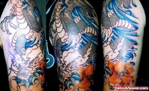 Flower And Japanese Tattoo On Half Sleeve