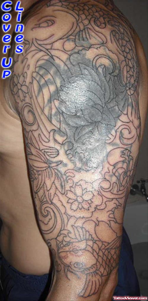 Japanese Flowers Tattoo On Man Left Sleeve