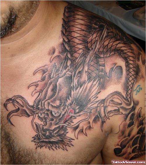 Grey Ink Japanese Dragon Tattoo On Left Shoulder