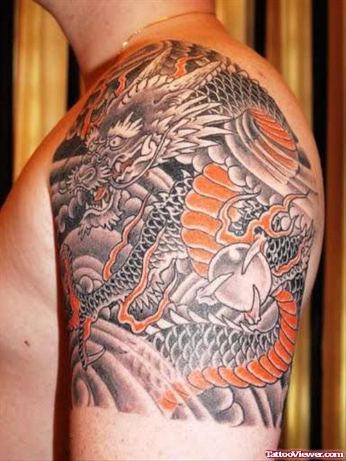 Grey Ink Dragon Japanese Tattoo On Man Left Shoulder
